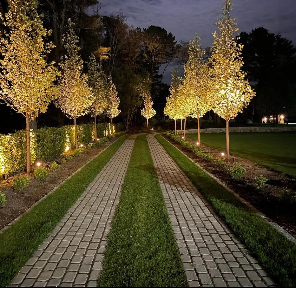 Outdoor landscape lighting installation for Cape Cod homes