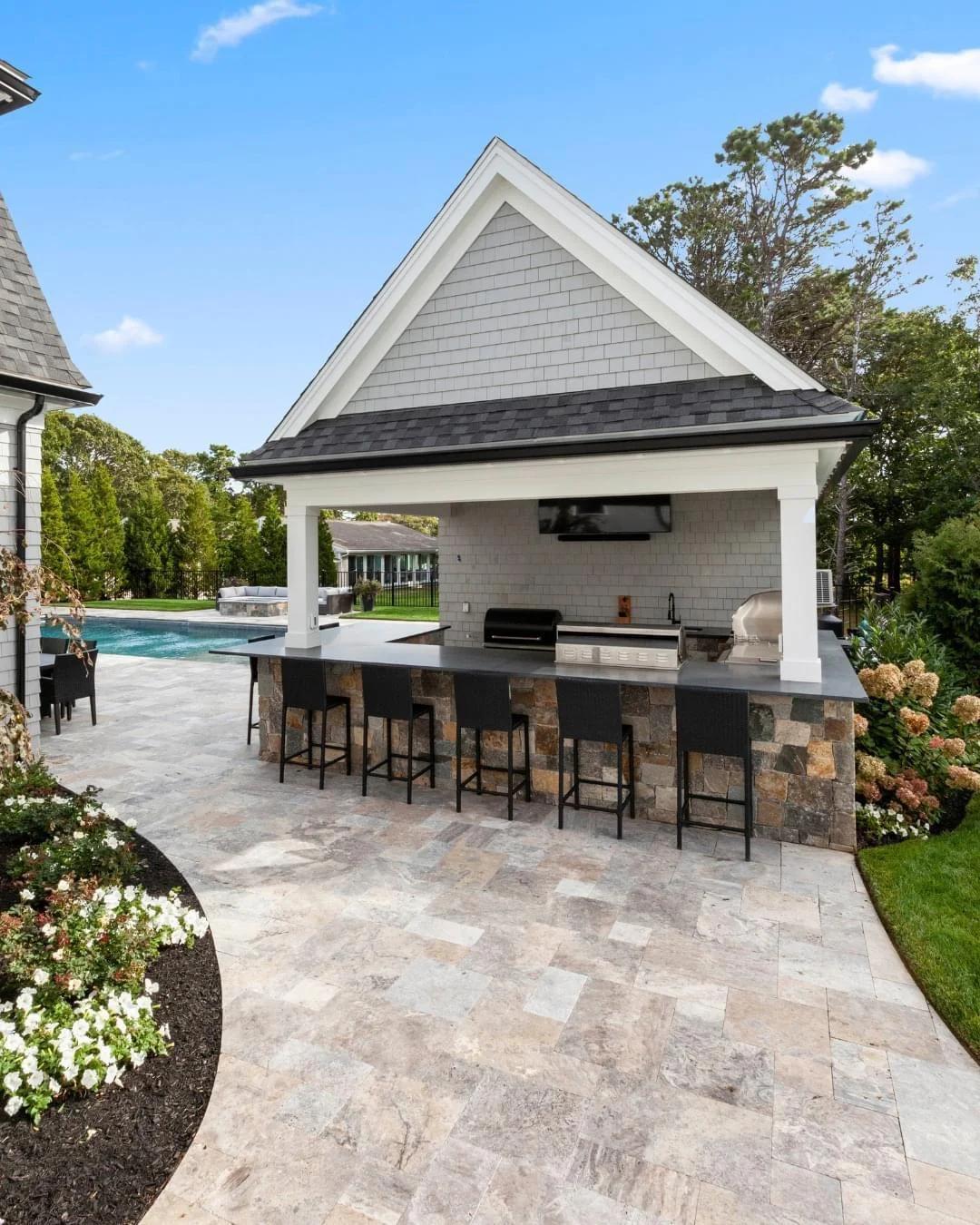 Outdoor living space with fire pit and paver patio